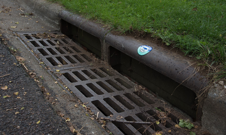 a storm drain with marker installed